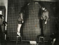 Nick and Kym performing a physics experiment