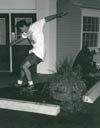 Nick landing the ollie over the planter at the bank
